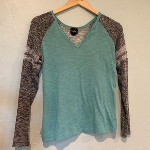 Super cute teal T shirt with see-through back!